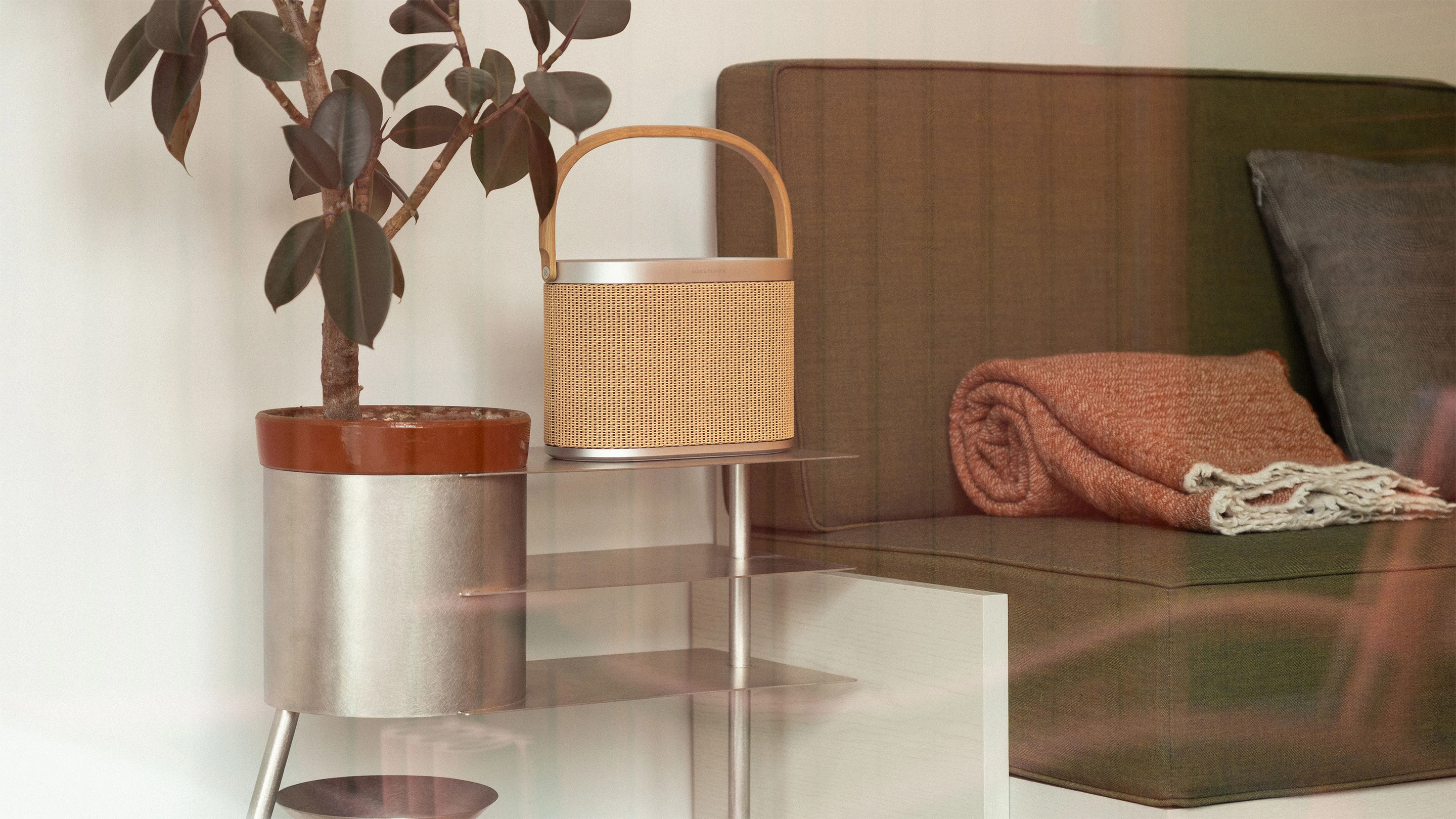 Beoplay A5 on an aluminium stand in living room