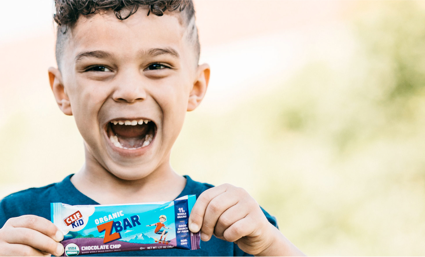 Kid holding CLIF Kid Chocolate Chip